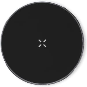 A round black wireless charger with a glossy surface and a subtle branding logo in the centre.