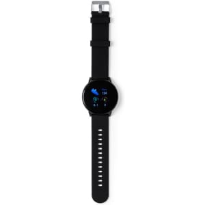 A black smart watch with a circular face and a digital display, featuring a silicone strap and a logo.