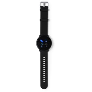 A black smart watch with a round face and a black strap, featuring a digital display and a logo.