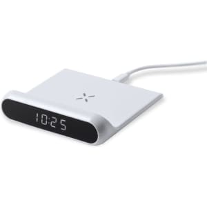 A white multifunction alarm clock featuring a digital display and connected by a charging cable.