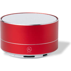 A red circular speaker with a silver rim and a mesh top. The speaker has a logo on its base.