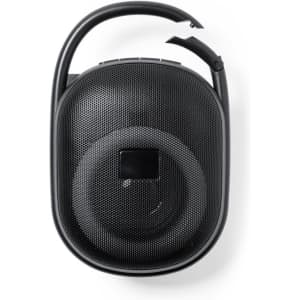 A compact black Bluetooth speaker with a textured surface and a sturdy handle. Features a small control panel on top.