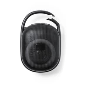 A black portable speaker with a textured surface, featuring a handle and buttons on the top. It has a logo.