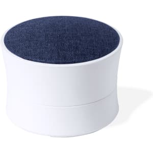 A round speaker with a white base and navy blue fabric top, featuring a logo on the side.