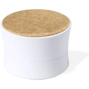 A round speaker with a white body and a textured tan top, featuring a logo on the side.