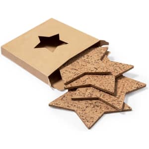 A set of star-shaped cork coasters in a cardboard packaging with a star cut-out.