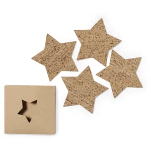 A set of four star-shaped cork coasters in a cardboard box with a cut-out star design.