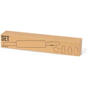 A bakery set featuring a wooden rolling pin and assorted cookie cutters in various shapes, all in a simple cardboard box.