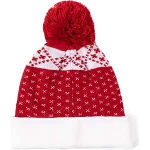 A red beanie with a white cuff and a large pom-pom on top, featuring a pattern of stars and bows.