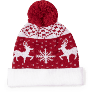 A red beanie featuring a festive reindeer and snowflake pattern, topped with a fluffy pom-pom. It has a white cuff and branding.