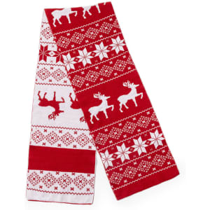 A red and white Luka Scarf featuring snowflakes and reindeer patterns, with a decorative knitted design.