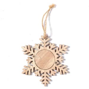 A wooden snowflake decoration in a light colour with a twine loop for hanging.