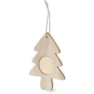 A wooden Christmas tree decoration in a pale colour, featuring a circular mirror centre and a hanging string.