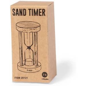 A sand timer in a cardboard box, featuring a wooden top and transparent glass sides, designed for a three-minute duration.