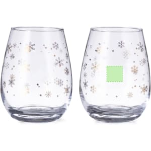 A set of two clear glass cups featuring silver and gold snowflake designs. Each cup has a rounded shape.