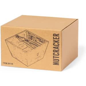 A cardboard box featuring a wooden-style design, containing a nutcracker. The box has a logo and description.