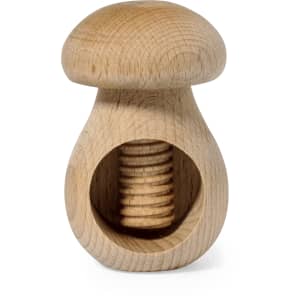 A wooden nutcracker shaped like a mushroom, featuring a textured interior for cracking nuts.