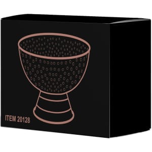A rose gold-patterned champagne bucket displayed within a black box, featuring an illustration on the front.