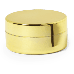 A gold lip balm container with a smooth, shiny surface and a fitting lid. It features a simple, round design.