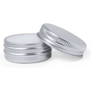 Two silver metal lip balm containers with smooth and ribbed lids positioned together.