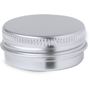 A small, silver metal lip balm container with a smooth, flat lid and ribbed edges.