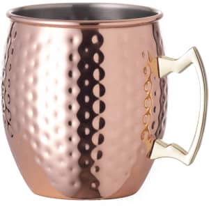 A copper drinkware mug with a textured surface and a gold-tone handle. Ideal for serving beverages.
