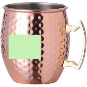 A copper mug with a hammered finish and a gold-coloured handle, featuring a blank area for customisation.