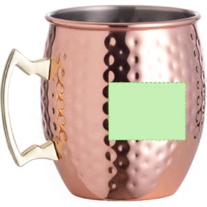 A copper-coloured mug with a textured finish and a gold handle. Features an area suitable for branding.