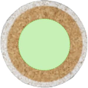 A circular game piece with a green centre and a beige outer ring, featuring a textured finish.