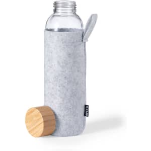 A drink bottle in clear glass, encased in grey felt, with a wooden stopper and hanging loop.
