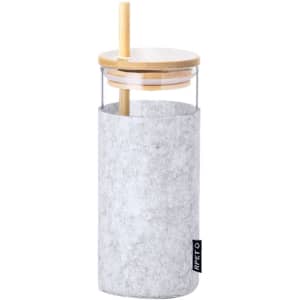 A drink bottle featuring a clear body with a grey felt sleeve, bamboo lid, and a straw. It has a logo.
