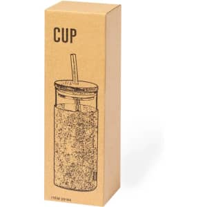 A drink cup in a cardboard packaging, featuring a straw, with a simple logo on the surface.