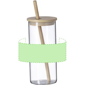 A glass tumbler with a bamboo lid and straw, featuring a circular green label.