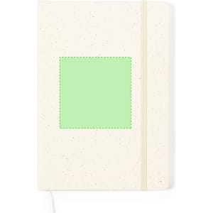 A cream notepad with a textured cover, featuring a green square area, and an elastic band closure.