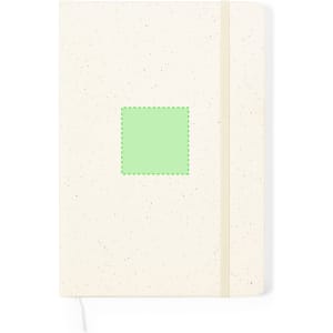 A cream-coloured notepad with a green square in the centre and a elastic band closure. It has a logo present.