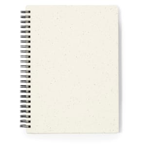 A cream-coloured spiral notebook with a speckled cover and a wire binding.
