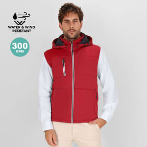 A red vest with a hood, featuring a zip closure and side pockets, displayed on a model against a light background.