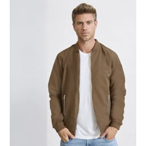 A brown jacket with a zip closure, featuring side pockets and a simple design, worn over a white T-shirt.