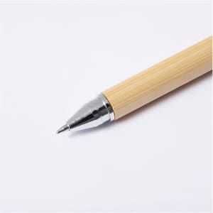 A pen with a bamboo barrel and a silver tip. It features a logo on the upper part of the barrel.