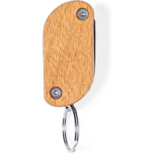 A wooden multitool keyring with a silver metal keyring attached. The design features a smooth wooden surface.