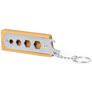 A multitool keyring featuring a stainless steel section with hexagonal cutouts and a bamboo handle, attached to a metal ring.