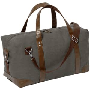 A grey bag with brown leather accents and handles, featuring a zip closure and shoulder strap.