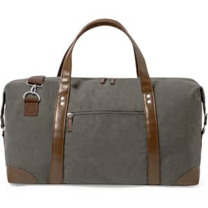 A grey bag with brown leather accents and handles, featuring a front zipper pocket and an adjustable strap.