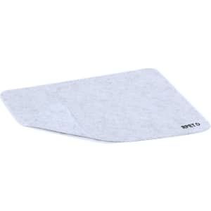 A grey mousepad with a textured surface. It features a logo in one corner.