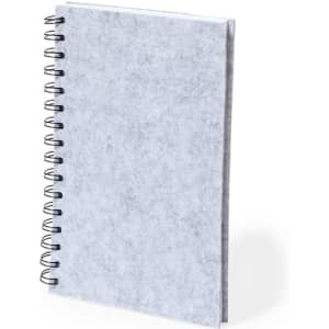 A grey spiral-bound notepad with a textured cover and blank pages. It features a metal coil binding.
