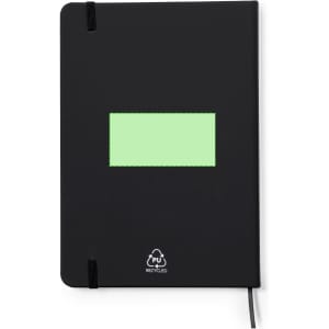 A black Zimax Notepad featuring a green rectangular area, with an elastic closure and recycling logo at the bottom.