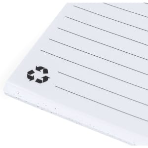 A white notebook with lined pages and a recycling symbol in one corner.