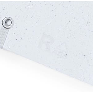A white notebook with a textured finish and a metallic binding, featuring a discreet logo on the cover.