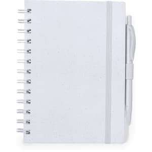A white notebook with a spiral binding and an attached pen, featuring a textured cover.