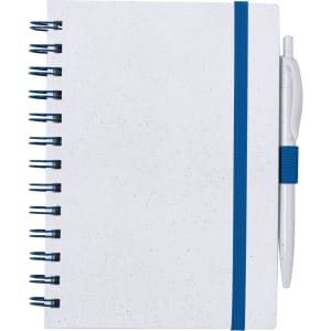 A white notebook with blue spirals and a blue elastic strap, accompanied by a white pen. It features a logo.